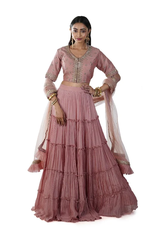Weekend Deal Rose Gold Pearls & Sequins Hand Embroidered Blouse paired with a 5 Layer Ruffle Lehenga & Pleated Dupatta Weekend Deal Rose Gold Pearls & Sequins Hand Embroidered Blouse paired with a 5 Layer Ruffle Lehenga & Pleated Dupatta