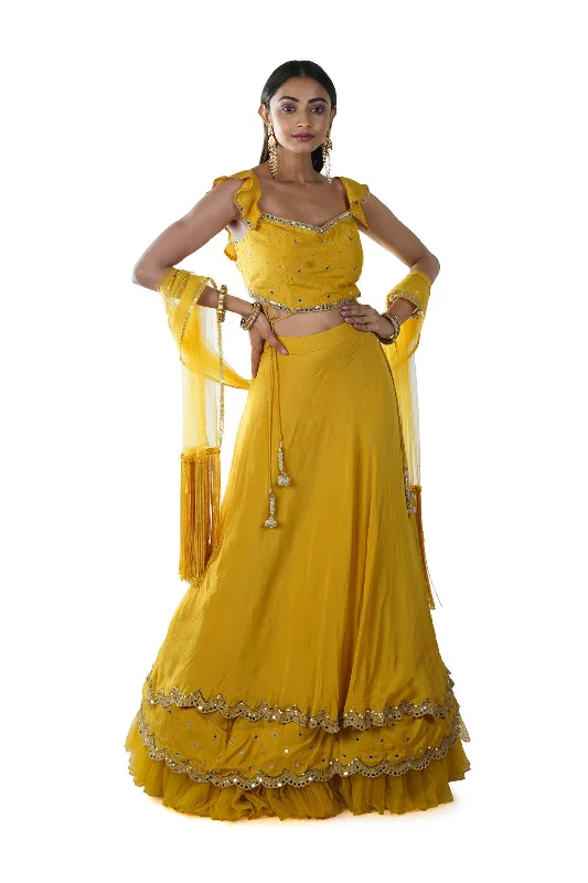 Price Rollback Mustard Yellow Mirror Embroidery Blouse paired with a Double Layered Ruffle Lehenga & Tassel Dupatta Price Rollback Mustard Yellow Mirror Embroidery Blouse paired with a Double Layered Ruffle Lehenga & Tassel Dupatta